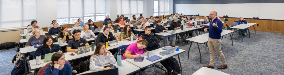 UB students in a classroom. 