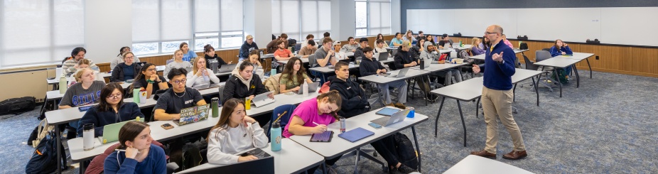 UB students in a classroom. 